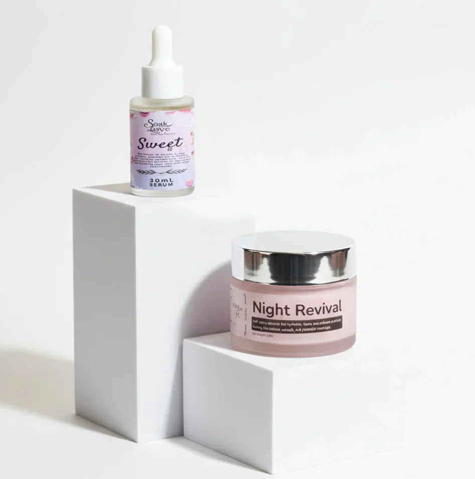 Soak In Love Ageless Beauty Bundle featuring Sweet Face Serum 30ml and Night Revival Cream displayed on a pink background for anti-aging skincare.