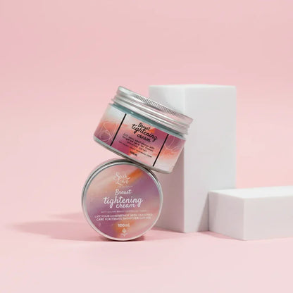100ml Breast Tightening Cream in a cosmetic jar with a pink label, designed to moisturize and improve the appearance of firmer, smoother skin.