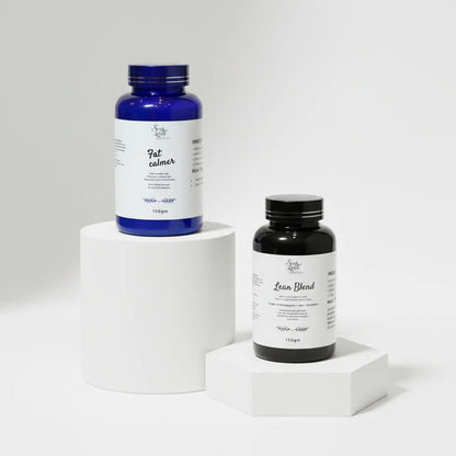 Soak In Love Fat Calmer and Lean Blend 150g herbal wellness supplement bundle displayed on white podiums against a clean white background.