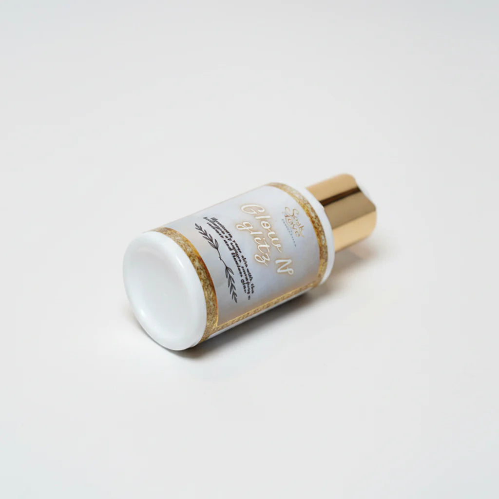 Soak Love Glow N Glitz lotion for soft, glowing skin.