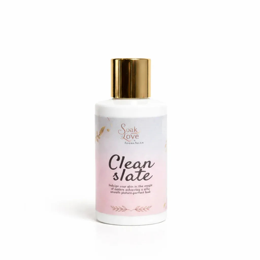 Bottle of Soak in Love Clean Slate Face Cleanser with a white and pink label and gold cap, designed to gently cleanse and refresh the skin.