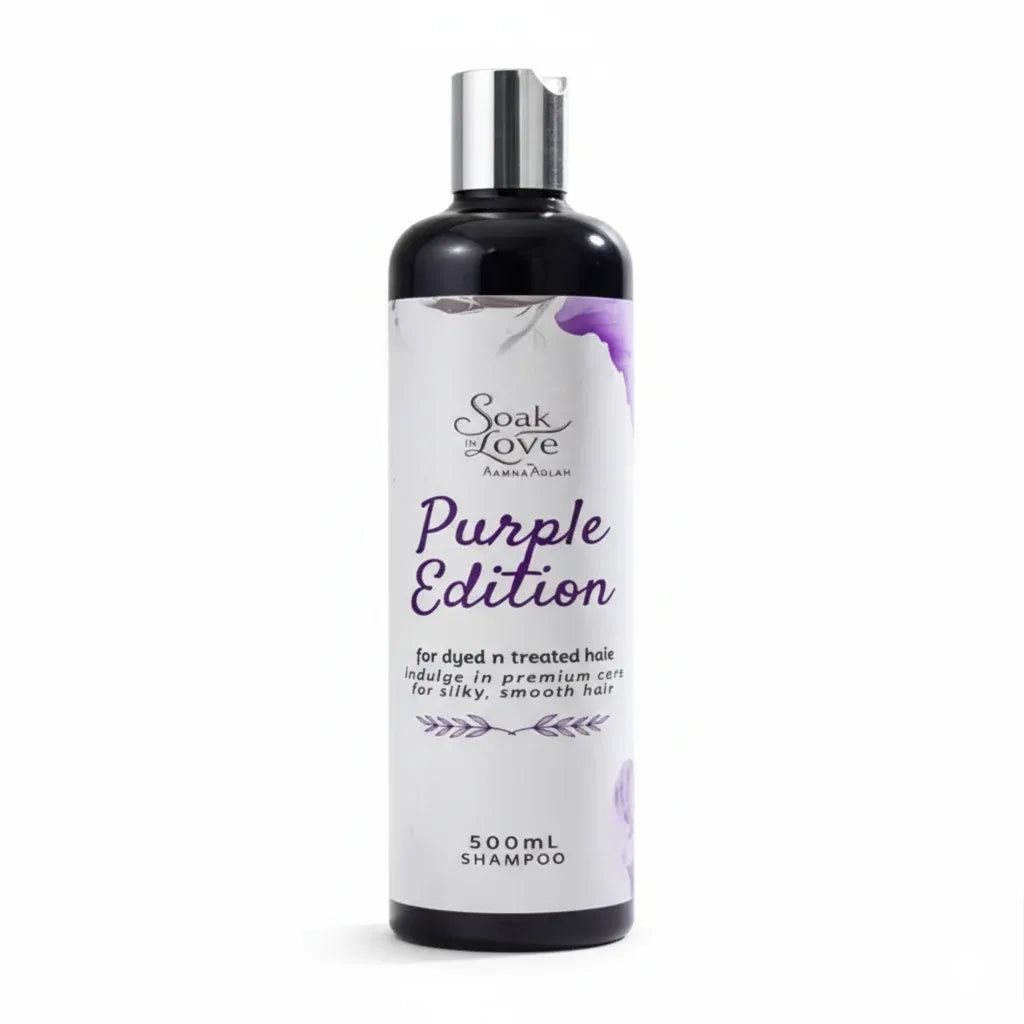 Soak in Love Purple Edition Shampoo 500ml bottle for dyed and color-treated hair with a white and purple floral label on a white background.