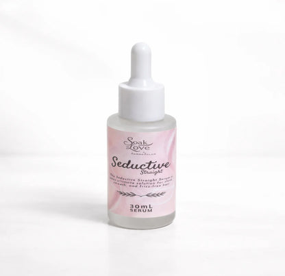 Hands holding a bottle of Soak in Love Seductive Starlight Face Serum 30ml with a glass dropper dispensing a clear serum for glowing and hydrated skin.